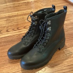 Black combat boots, size 11.